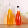Botellas de agua de vidrio de 500 ml para agua mineral con tapas