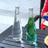 Embalaje de vaso de jugo popular personalizado de alta calidad 500 ml 330 ml de botella de vidrio vacío botellas de agua mineral