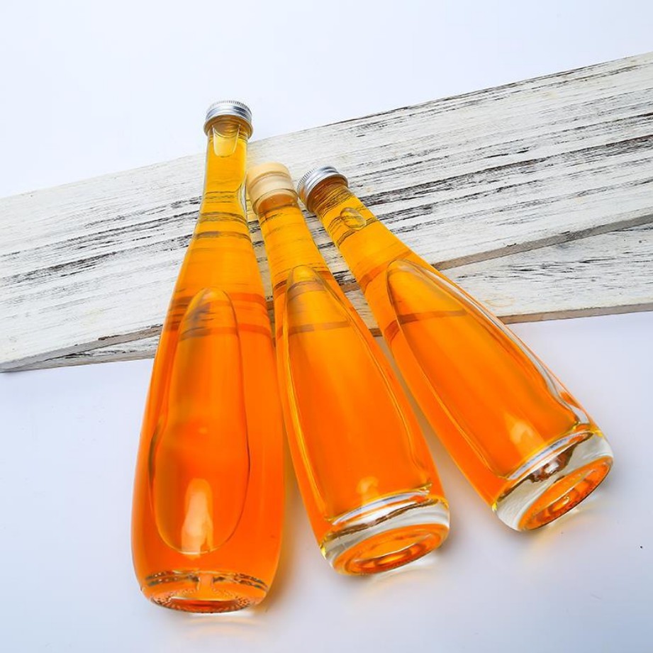 Botellas de vidrio de alta calidad para envases de bebidas de vidrio de agua mineral